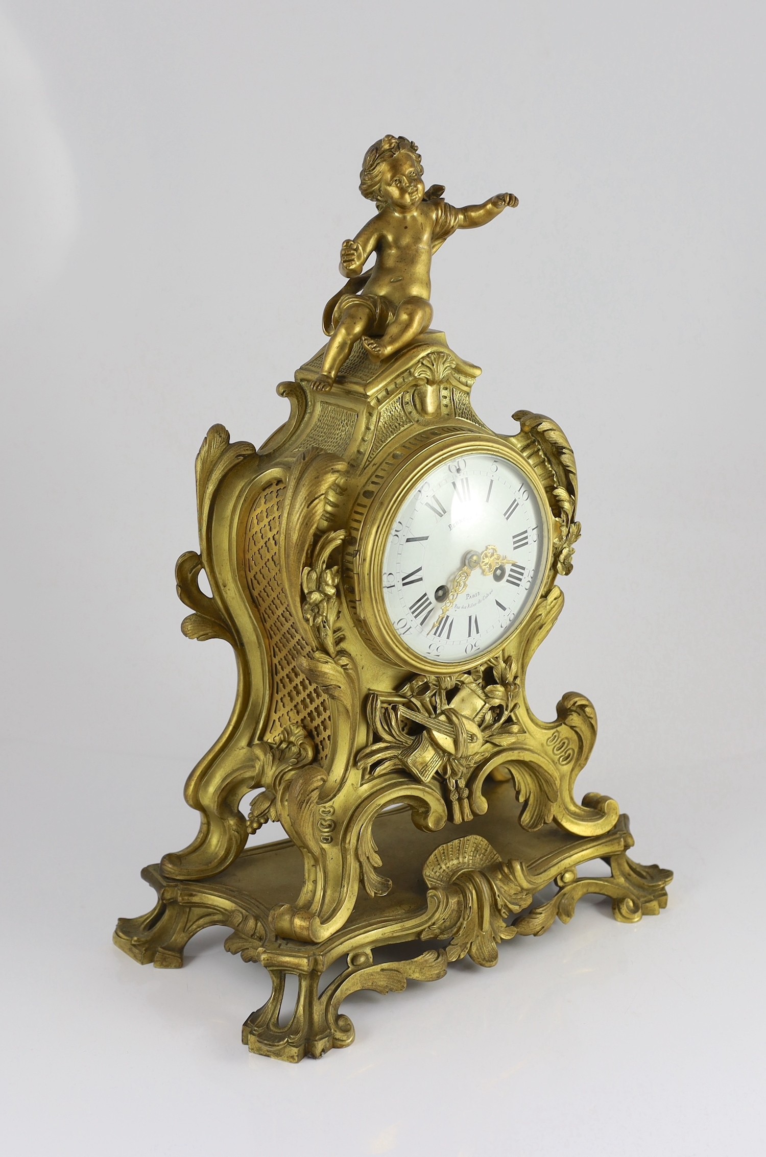 Bernoux of Paris. A 19th century Louis XV style ormolu mantel clock, 33cm wide, 48cm high